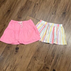 Girls skirt bundle. Both have shorts underneath. Like new condition.